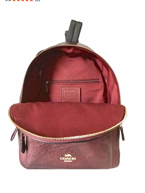 Coach EUC Charlie Metallic Wine Pebbled Leather medium Backpack with hang tag